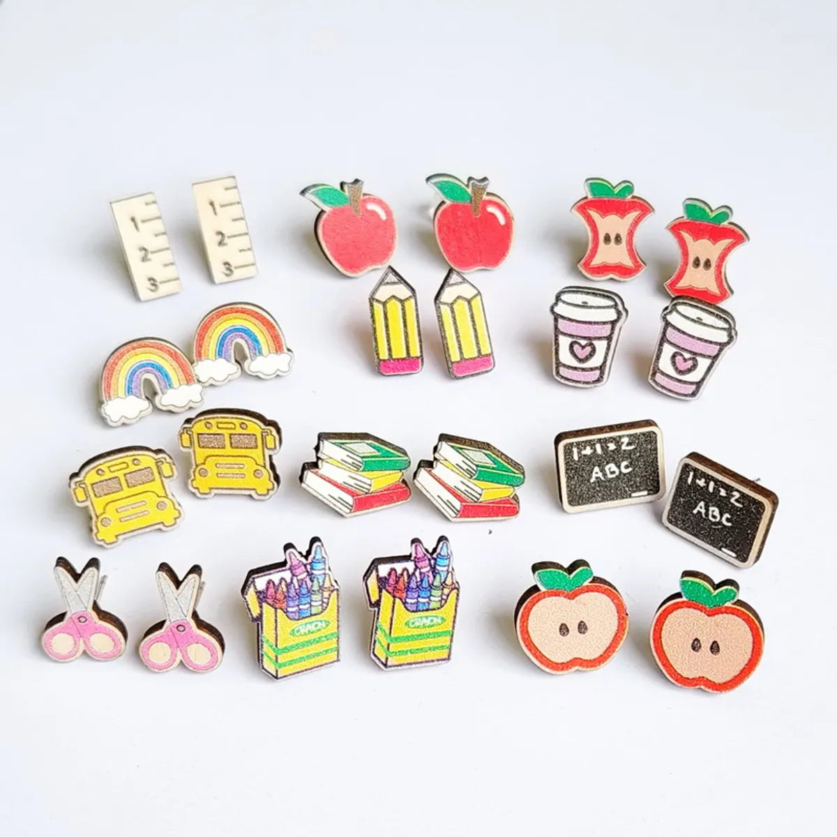 1 Pair Cartoon Style Book Rainbow Apple Wood Printing Women'S Ear Studs