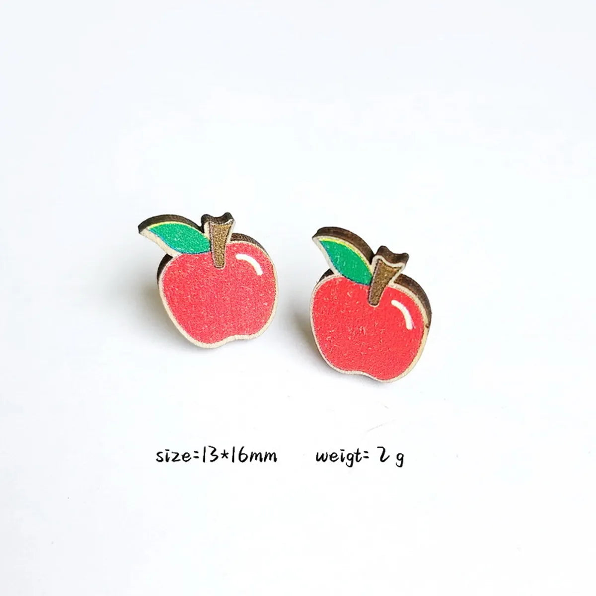 1 Pair Cartoon Style Book Rainbow Apple Wood Printing Women'S Ear Studs