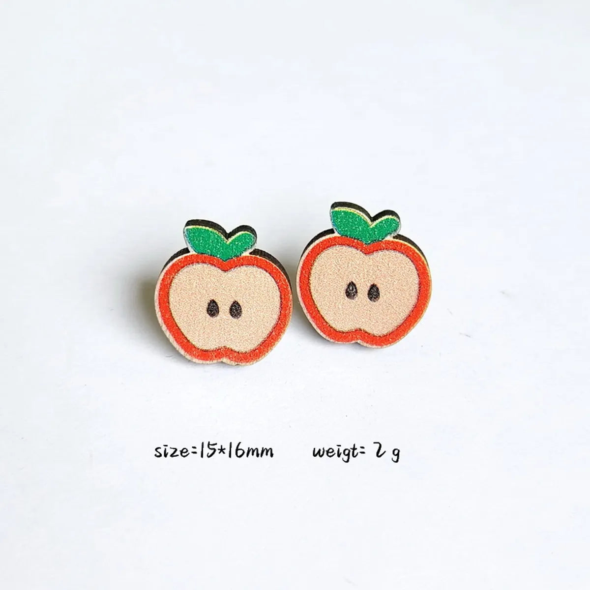 1 Pair Cartoon Style Book Rainbow Apple Wood Printing Women'S Ear Studs