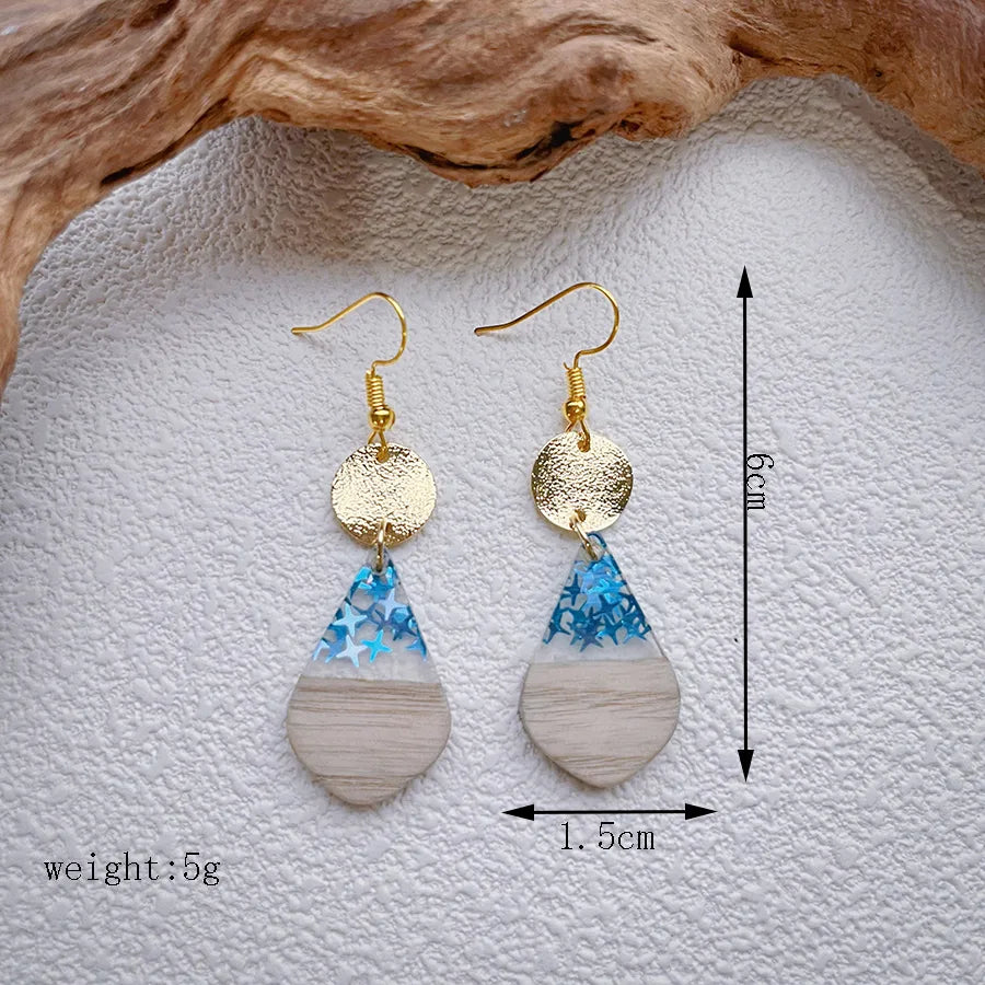 1 Pair Casual Classic Style Artistic Geometric Round Star Hollow Out Inlay Synthetic Resin Wood Artificial Pearls Drop Earrings