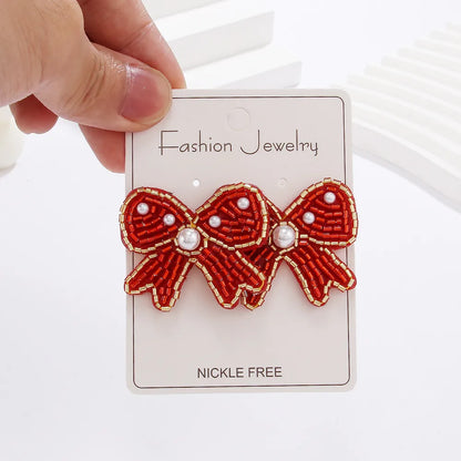 1 Pair Casual Elegant Simple Style Bow Knot Inlay Beaded Seed Bead Artificial Pearls Ear Studs