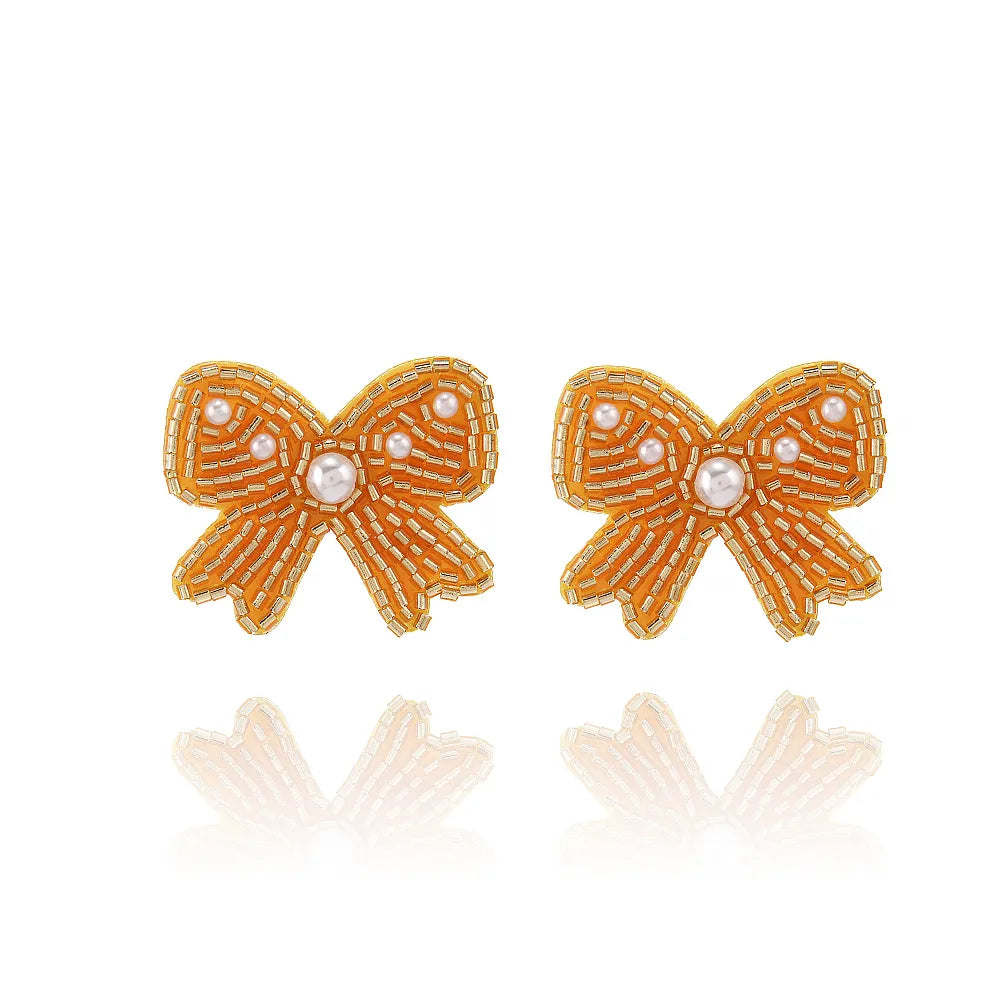 1 Pair Casual Elegant Simple Style Bow Knot Inlay Beaded Seed Bead Artificial Pearls Ear Studs