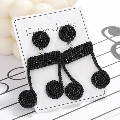 1 Pair Casual Rock Solid Color Notes Beaded Nonwoven Glass Drop Earrings