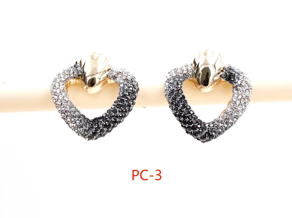 1 Pair Casual Simple Style Heart Shape Inlay Alloy Rhinestones Ear Studs