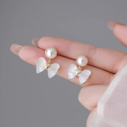 1 Pair Elegant Korean Style Bow Knot Inlay Alloy Artificial Pearls Drop Earrings