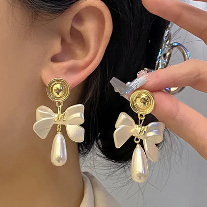 1 Pair Elegant Luxurious Queen Heart Shape Wings Bow Knot Plating Inlay Alloy Rhinestones 14k Gold Plated Drop Earrings