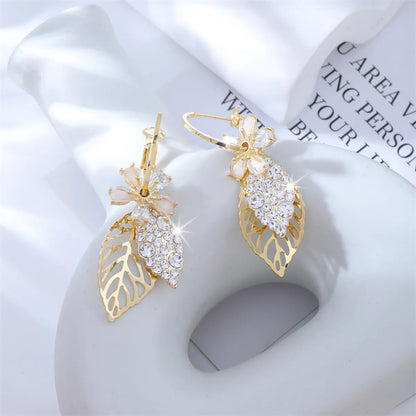 1 Pair Elegant Simple Style Classic Style Leaves Flower Hollow Out Inlay Copper Alloy Rhinestones Drop Earrings