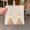 1 Pair Elegant Simple Style Streetwear Geometric Star Bow Knot Inlay Alloy Artificial Rhinestones Artificial Pearls Drop Earrings