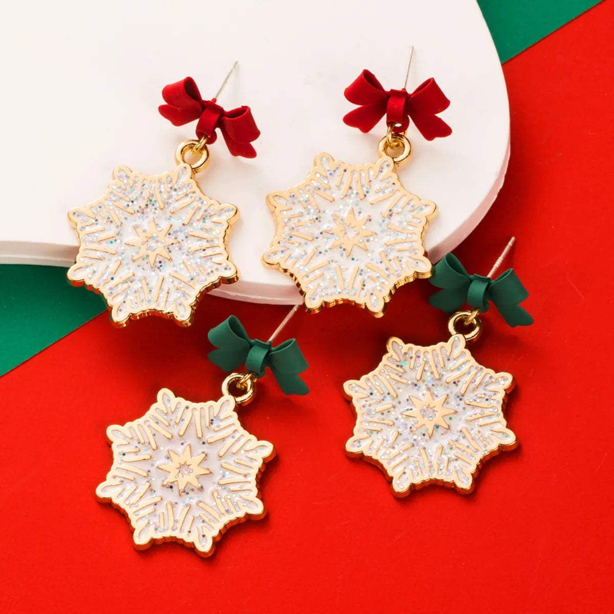 1 Pair Elegant Streetwear Bow Knot Snowflake Enamel Alloy Gold Plated Drop Earrings