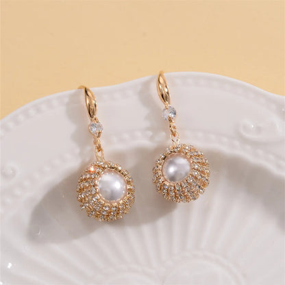 1 Pair Elegant Vacation Shiny Irregular Bow Knot Plating Inlay Copper Freshwater Pearl Zircon Drop Earrings