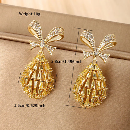 1 Pair Elegant Xuping Geometric Bow Knot Hollow Out Copper Alloy Artificial Gemstones 14k Gold Plated Drop Earrings