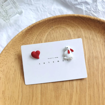 1 Pair Fashion Rabbit Heart Shape Imitation Pearl Alloy Asymmetrical Enamel Stoving Varnish Women's Ear Studs