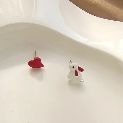 1 Pair Fashion Rabbit Heart Shape Imitation Pearl Alloy Asymmetrical Enamel Stoving Varnish Women's Ear Studs