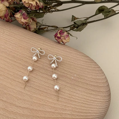 1 Pair Fashion Star Flower Imitation Pearl Alloy Inlay Rhinestones Women'S Earrings