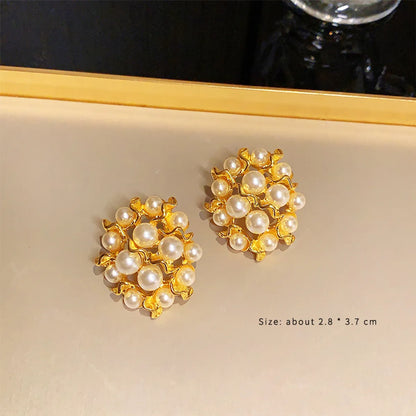 1 Pair Glam Retro Devil'S Eye Flower Inlay Alloy Artificial Pearls Rhinestones Drop Earrings