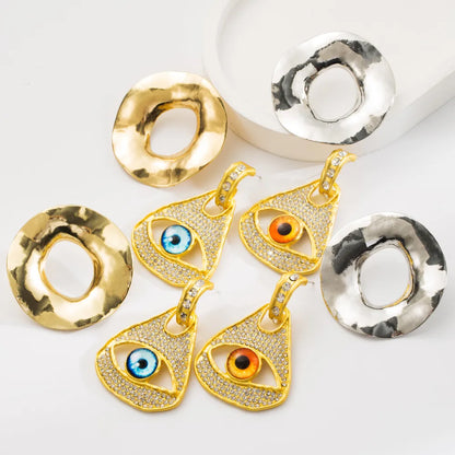 1 Pair Hip-Hop Exaggerated Rock Geometric Devil'S Eye Inlay Alloy Resin Rhinestones Gold Plated Silver Plated Drop Earrings Ear Studs