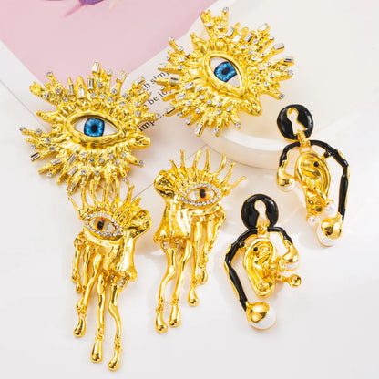 1 Pair Hip-Hop Exaggerated Rock Organ Devil'S Eye Nose Inlay Alloy Rhinestones Gold Plated Drop Earrings