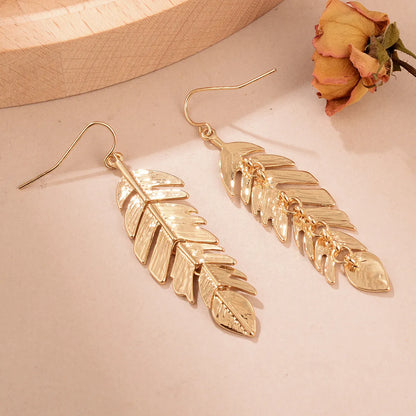 1 Pair Ig Style Elegant Leaves Feather Plating Hollow Out Inlay Alloy Copper Artificial Pearls Rhinestones 14k Gold Plated 18k Gold Plated Silver Plated Drop Earrings