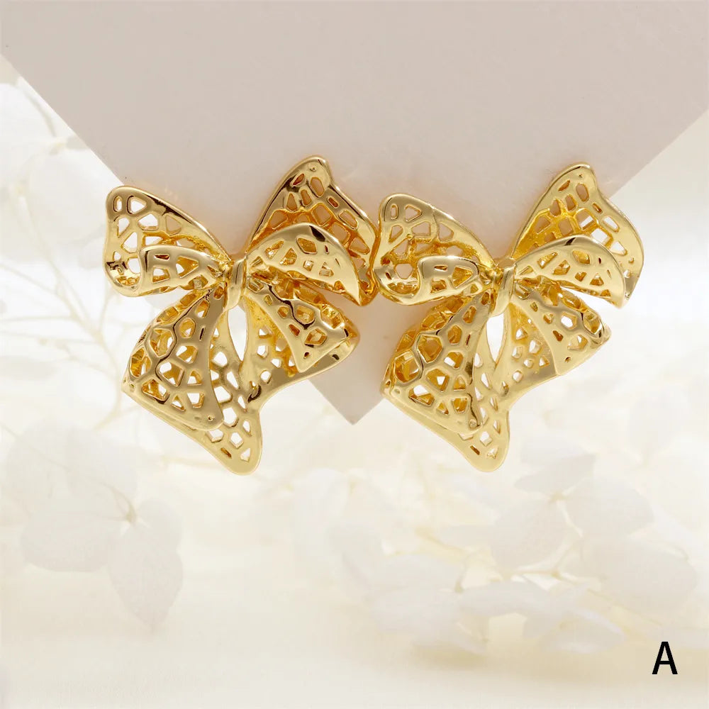 1 Pair IG Style Exaggerated Streetwear Water Droplets Bow Knot Three-Dimensional Copper 18K Gold Plated Drop Earrings Ear Studs