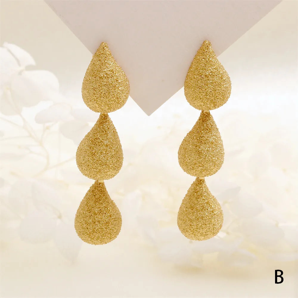 1 Pair IG Style Exaggerated Streetwear Water Droplets Bow Knot Three-Dimensional Copper 18K Gold Plated Drop Earrings Ear Studs