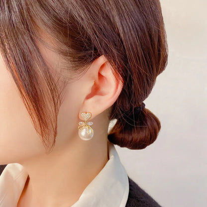 1 Pair Ig Style Korean Style Heart Shape Bow Knot Plating Inlay Imitation Pearl Alloy Zircon Drop Earrings