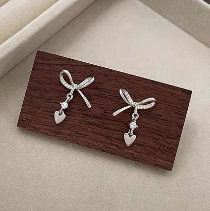 1 Pair IG Style Romantic Sweet Heart Shape Bow Knot Plating Inlay Sterling Silver Zircon Ear Studs