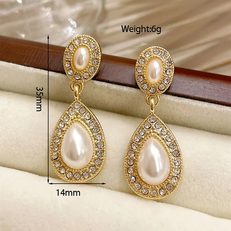 1 Pair Ig Style Simple Style Water Droplets Plating Inlay Alloy Acrylic Rhinestones Pearl Gold Plated Drop Earrings Ear Cuffs