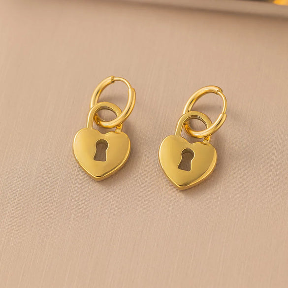 1 Pair IG Style Sweet Simple Style Heart Shape Hollow Out Inlay Titanium Steel Zircon Ear Studs