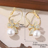 1 Pair Lady Vacation Streetwear Letter Bow Knot Inlay Copper Imitation Pearl Rhinestones Zircon 18K Gold Plated Drop Earrings