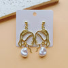 1 Pair Retro Classic Style Human Hollow Out Artificial Pearl Alloy Drop Earrings