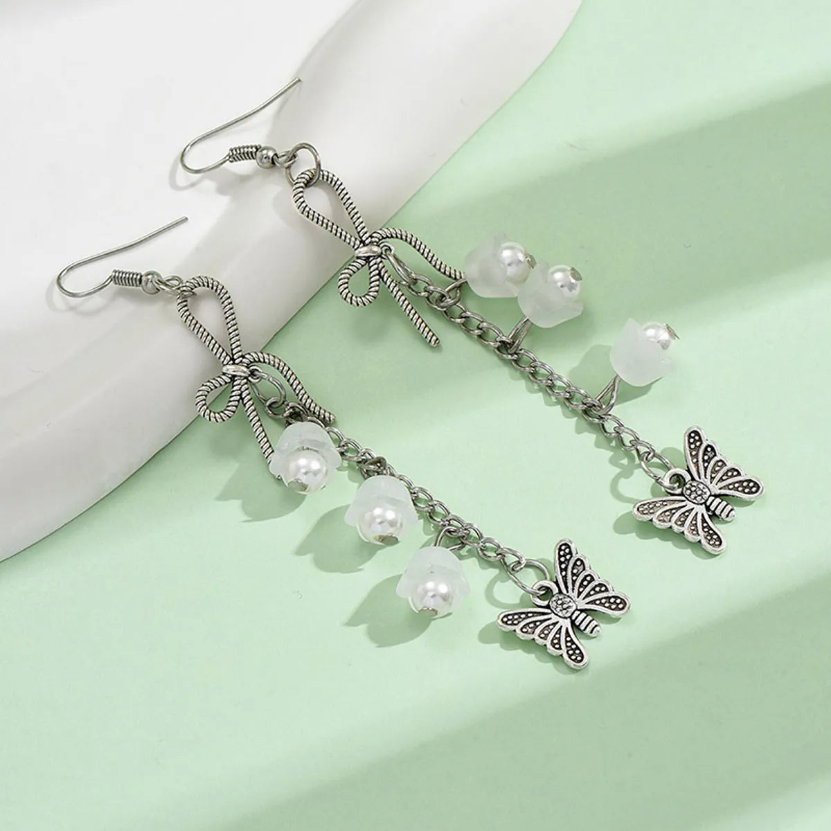 1 Pair Retro Simple Style Butterfly Bow Knot Pearl Alloy Drop Earrings