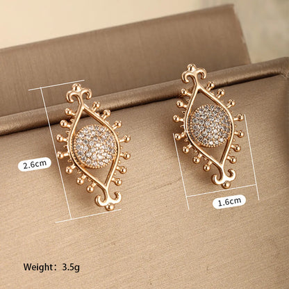 1 Pair Retro Xuping Devil'S Eye Eye Plating Inlay Alloy Copper Alloy Artificial Gemstones 18k Gold Plated Ear Studs