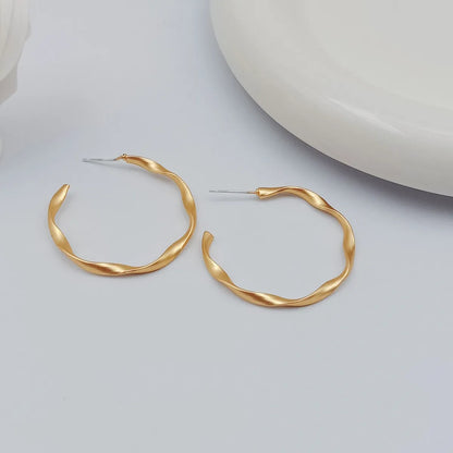 1 Pair Simple Style Circle Flower Plating Iron Ear Studs