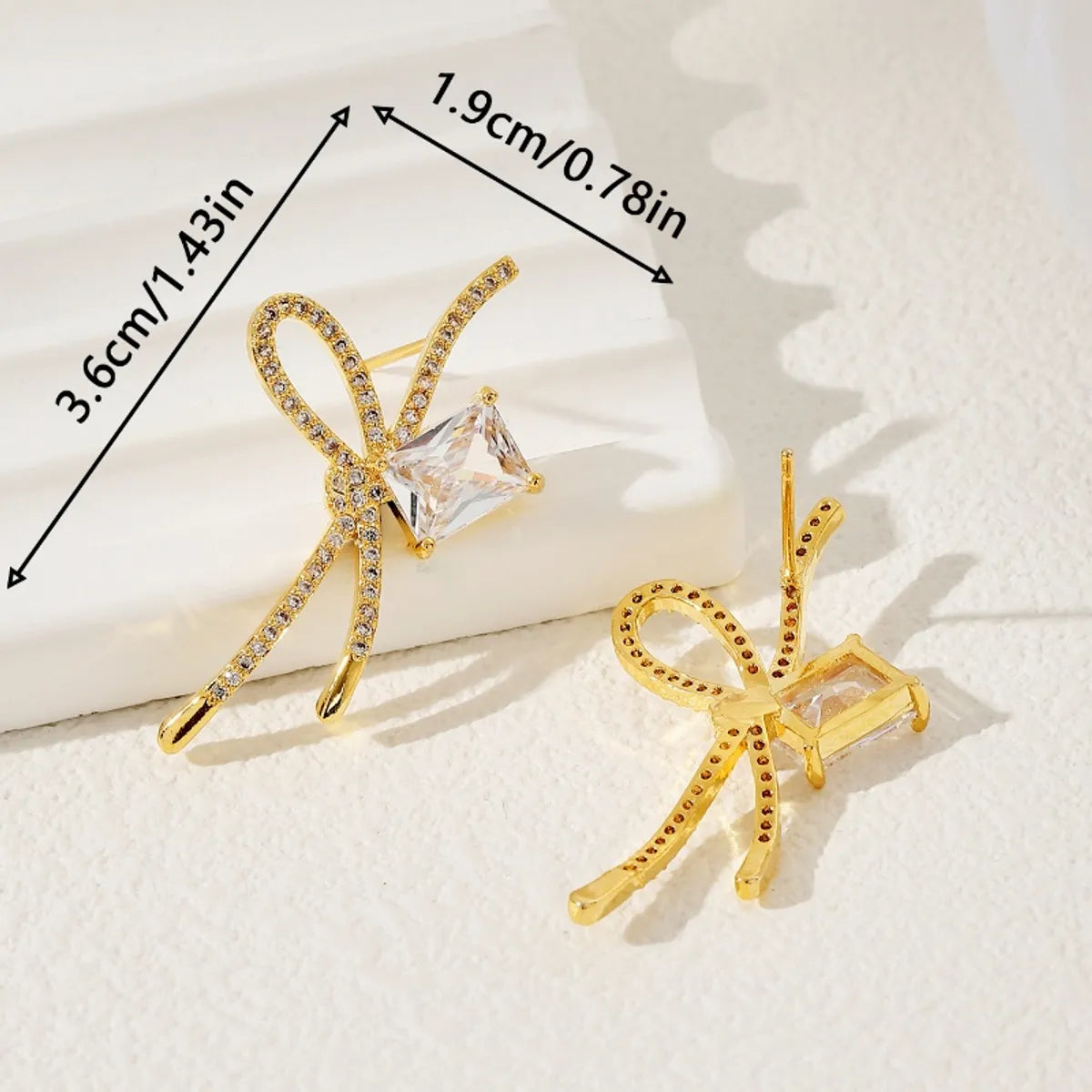 1 Pair Simple Style Classic Style Asymmetrical Bow Knot Plating Inlay Copper Zircon 18K Gold Plated Drop Earrings