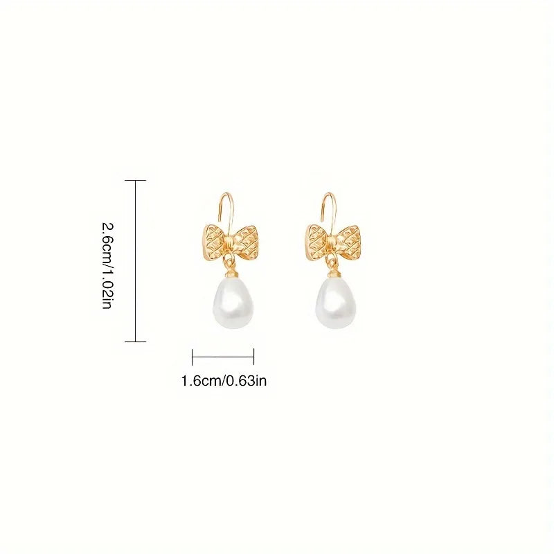 1 Pair Simple Style Classic Style Bow Knot Inlay Copper Artificial Pearls Drop Earrings