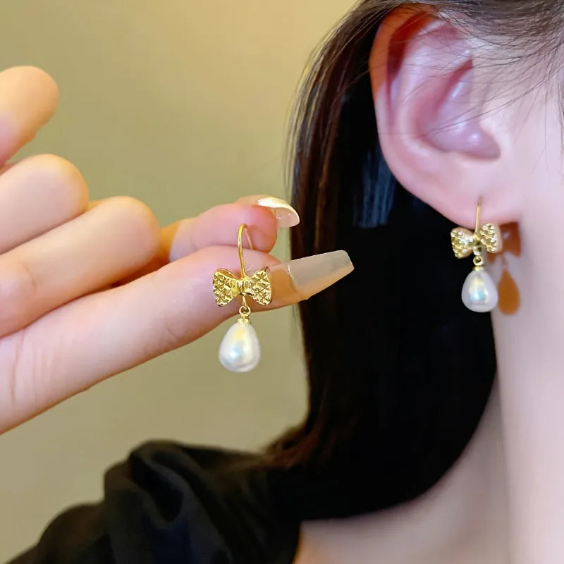 1 Pair Simple Style Classic Style Bow Knot Inlay Copper Artificial Pearls Drop Earrings