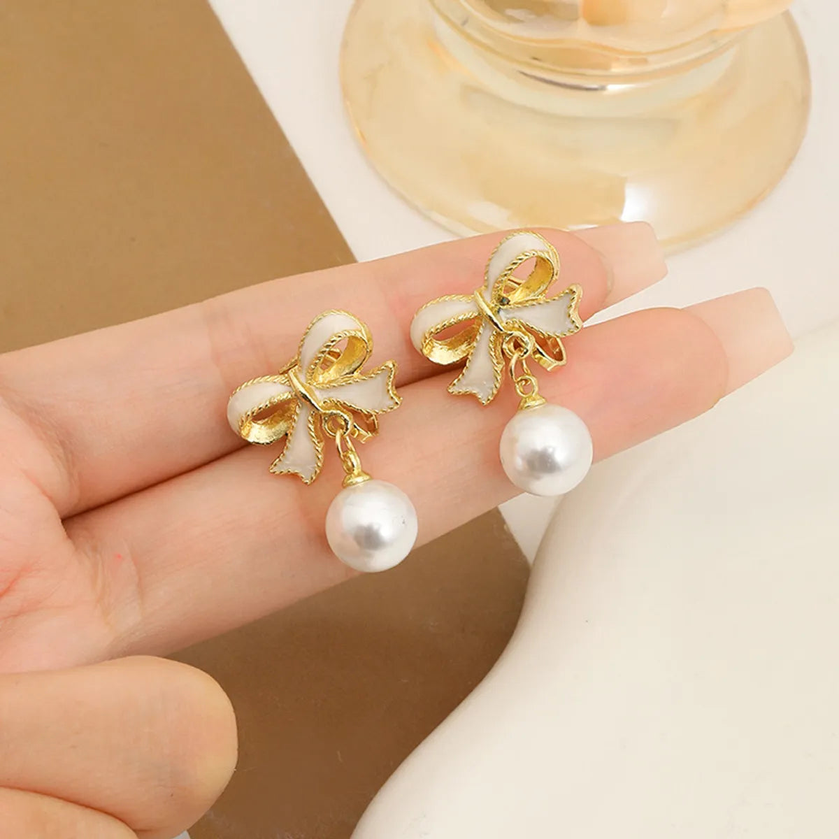 1 Pair Simple Style Classic Style Bow Knot Plating Alloy Zinc Alloy Drop Earrings