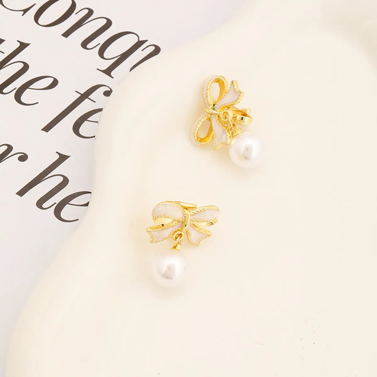 1 Pair Simple Style Classic Style Bow Knot Plating Alloy Zinc Alloy Drop Earrings