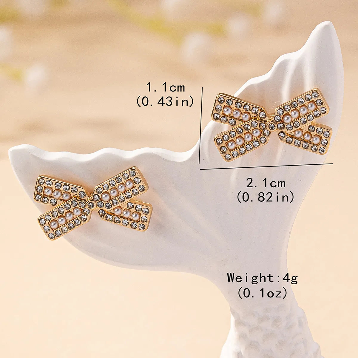 1 Pair Simple Style Classic Style Commute Bow Knot Inlay Plastic Zinc Alloy Artificial Pearls Rhinestones Ear Studs