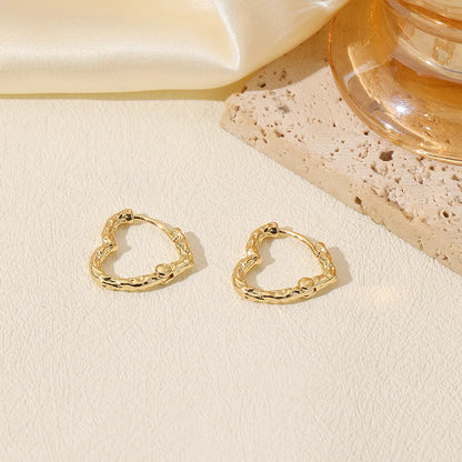 1 Pair Simple Style Classic Style Commute Heart Shape Hollow Out Copper 18K Gold Plated Earrings