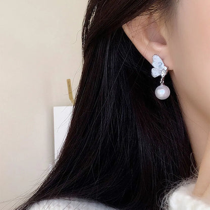 1 Pair Simple Style Classic Style Wings Plating Inlay Alloy Artificial Rhinestones Artificial Pearls White Gold Plated Drop Earrings