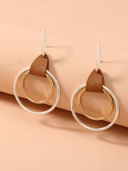 1 Pair Simple Style Commute Color Block Irregular Hollow Out Pu Leather Drop Earrings