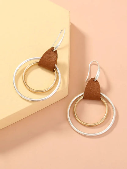 1 Pair Simple Style Commute Color Block Irregular Hollow Out Pu Leather Drop Earrings