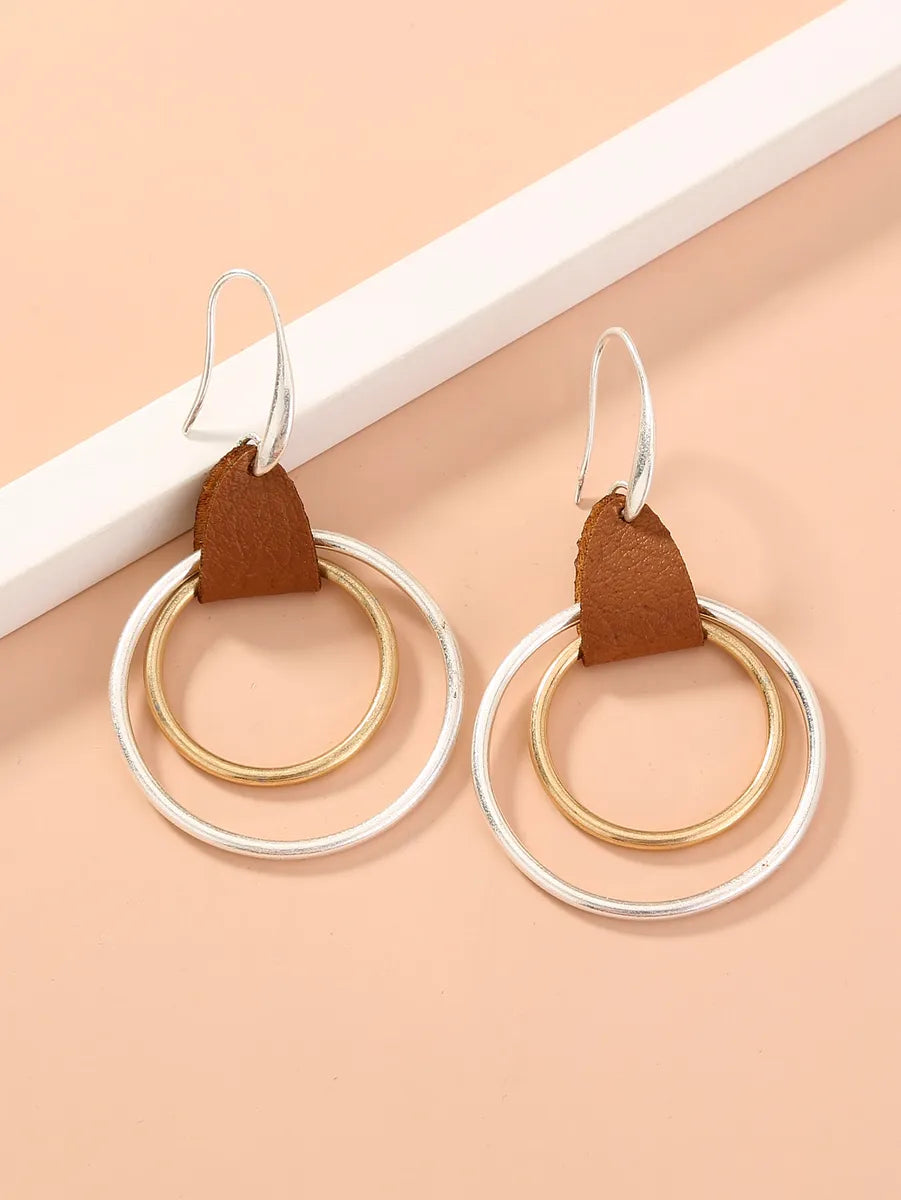 1 Pair Simple Style Commute Color Block Irregular Hollow Out Pu Leather Drop Earrings