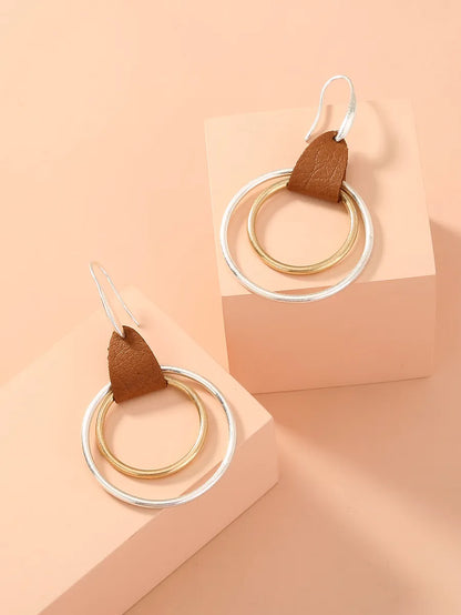 1 Pair Simple Style Commute Color Block Irregular Hollow Out Pu Leather Drop Earrings