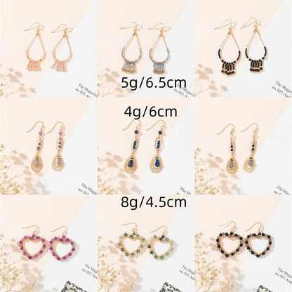 1 Pair Simple Style Commute Water Droplets Heart Shape Hollow Out Inlay Alloy Artificial Crystal Zircon Drop Earrings