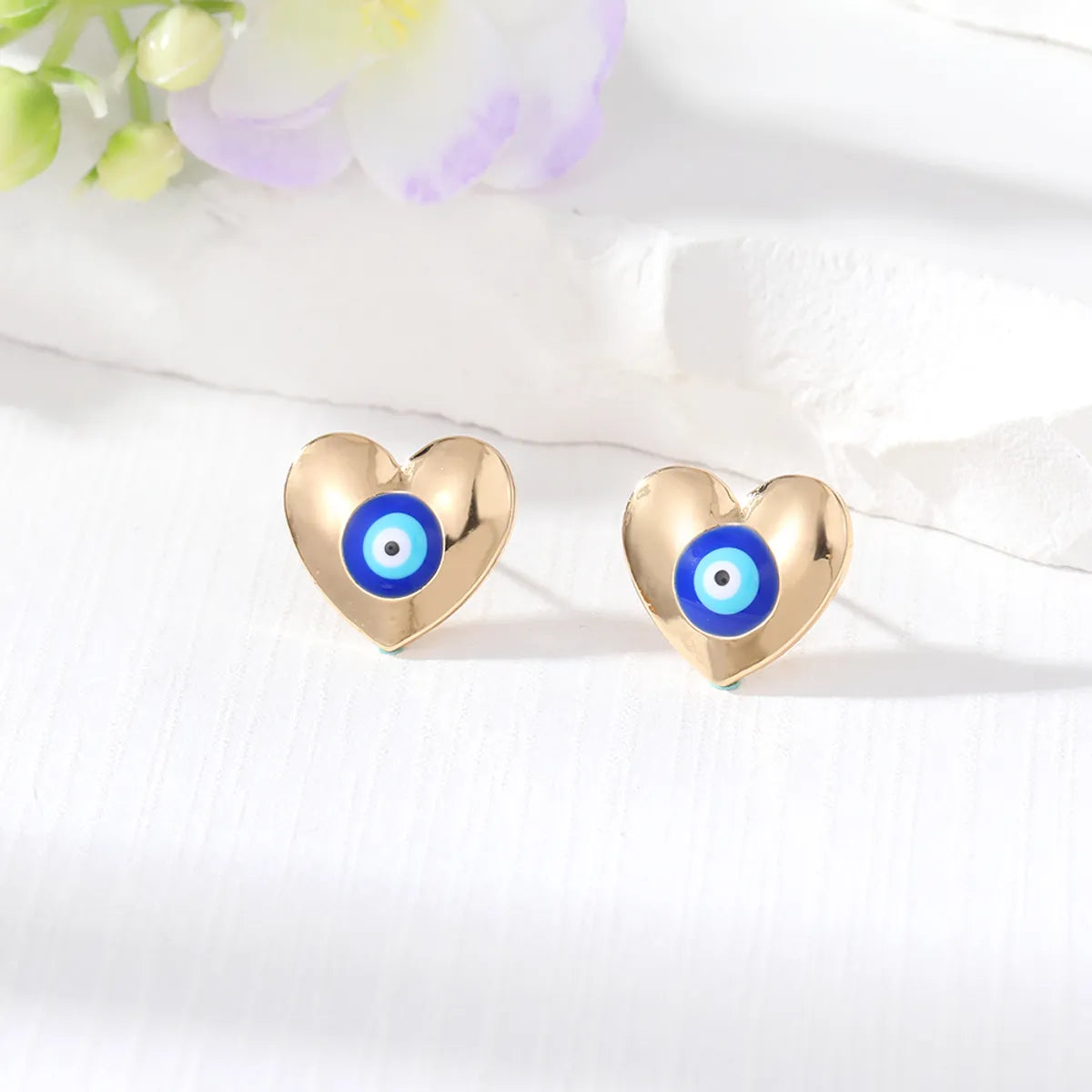 1 Pair Simple Style Devil'S Eye Hand Heart Shape Alloy Women'S Ear Studs