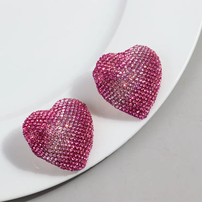 1 Pair Simple Style Heart Shape Alloy Ear Studs