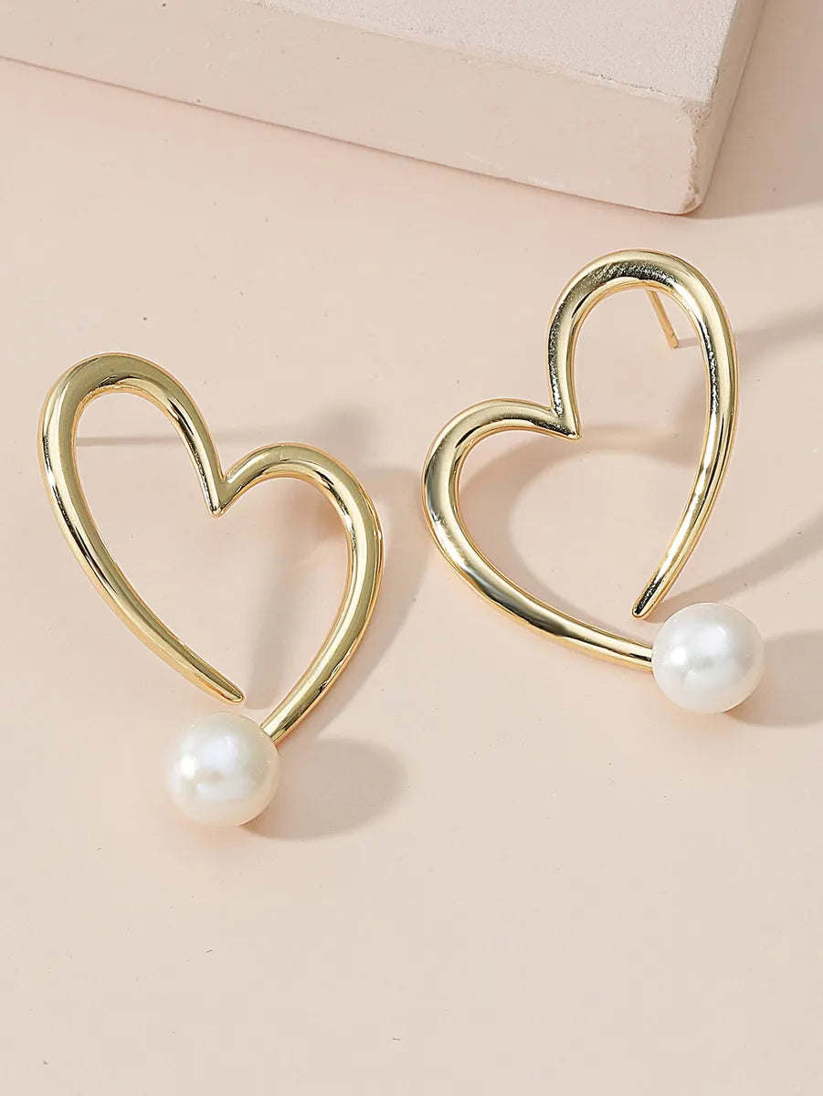 1 Pair Simple Style Heart Shape Hollow Out Inlay Alloy Artificial Pearls Ear Studs