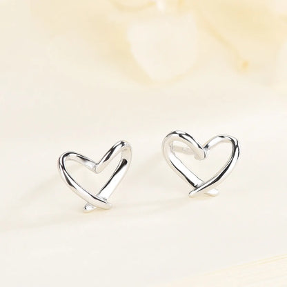 1 Pair Simple Style Heart Shape Hollow Out Sterling Silver Ear Studs